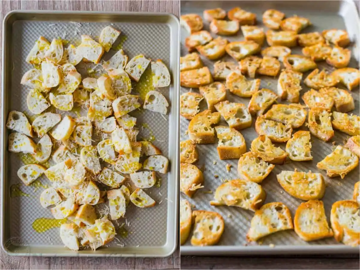Golden brown Parmesan garlic croutons spread evenly on a baking sheet, freshly baked and ready for the Caesar Salad.
