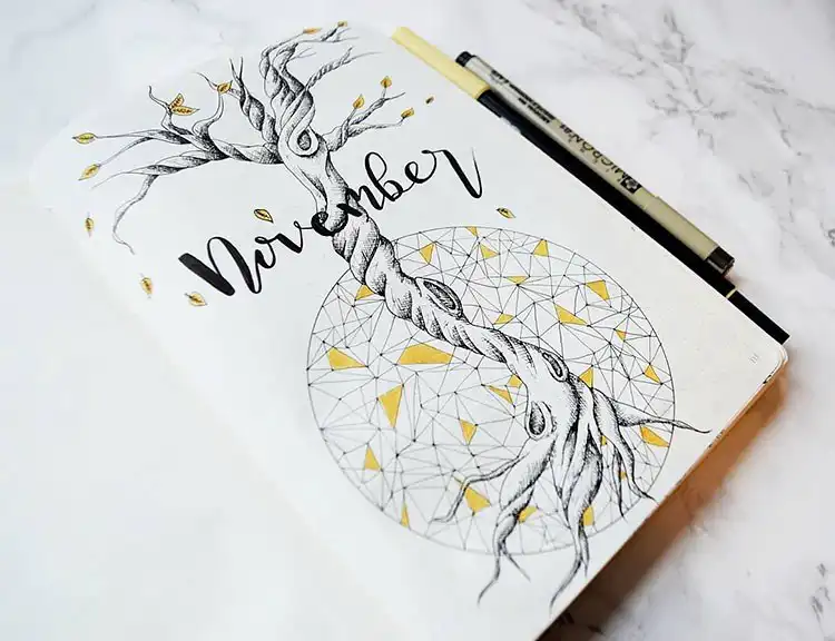 Minimalist drawing of a tree with visible roots, creating a unique and artistic November bullet journal cover