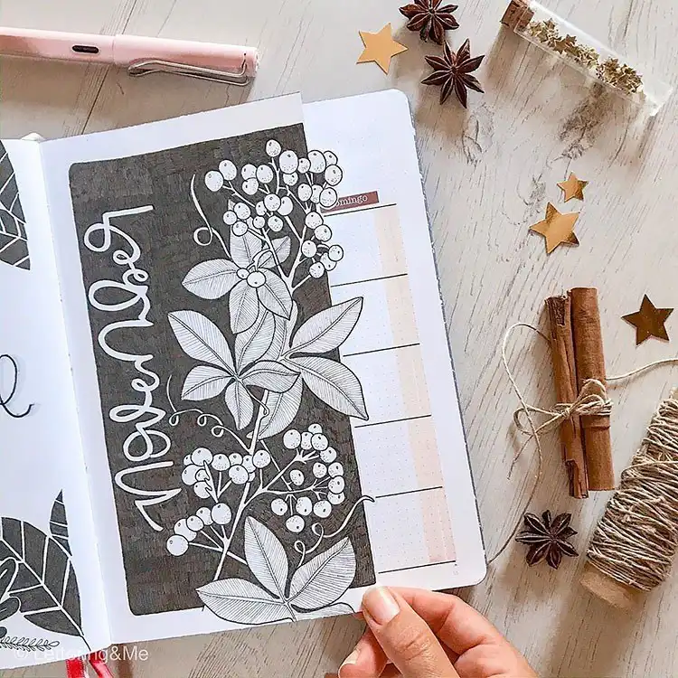 Black and white drawing of intricate leaves and berries for a unique November bullet journal cover page