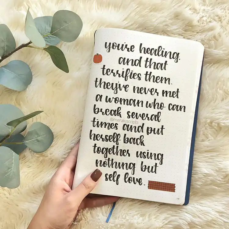Inspirational healing quote page with elegant typography for a November bullet journal spread, promoting self-love