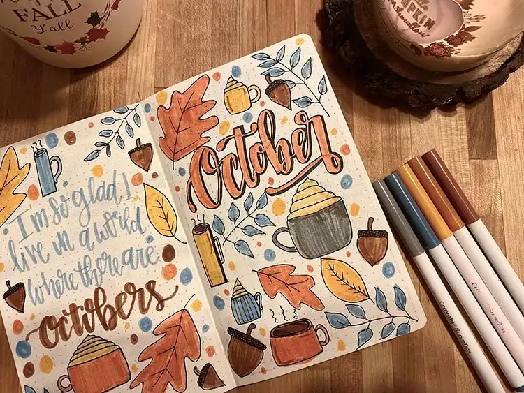 Unique October bullet journal design featuring a whale in a jar surrounded by clouds with an intriguing color palette.
