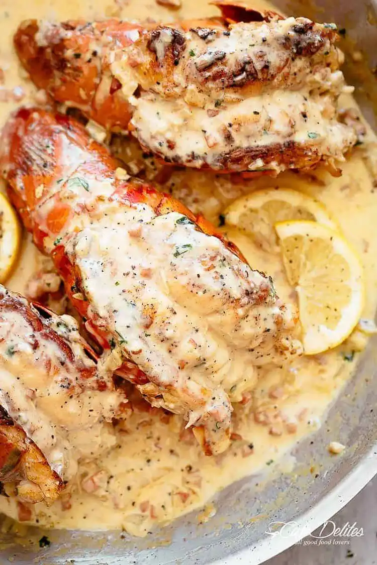 Creamy Bacon Lobster Tails, perfectly cooked with crispy bacon bits, served elegantly.