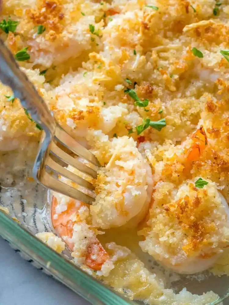 Crispy Baked Shrimp with golden-brown breadcrumb coating, served with lemon wedges and fresh parsley.
