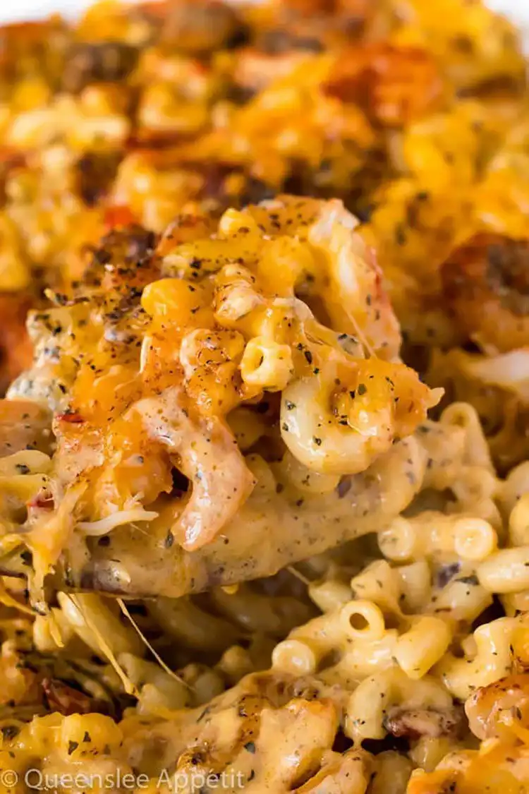 Cajun Shrimp and Crab Mac and Cheese, bubbling hot with a rich cheesy sauce and visible pieces of seafood.