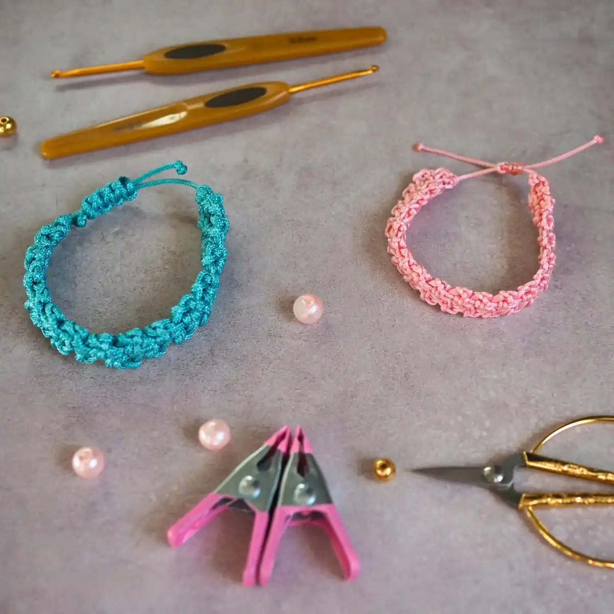 A finished crocheted friendship bracelet featuring a perfectly executed adjustable square knot closure, ready to be worn.