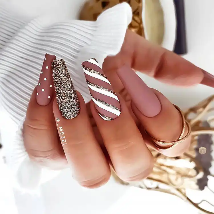 Stunning Blue Nail Designs - Perfect Winter Nail Design Ideas 11 Matte Nails with Glitter design, a high-quality stand-out look combining luxurious matte polish with sparkling details for stunning blue nail designs.
