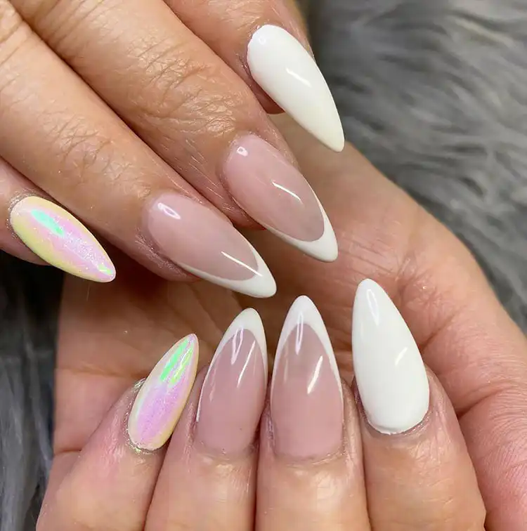 Stunning Blue Nail Designs - Perfect Winter Nail Design Ideas 17 Classic French Tip Nails in white, elegant and versatile for holiday events and daily wear during winter, complementing stunning blue nail designs.