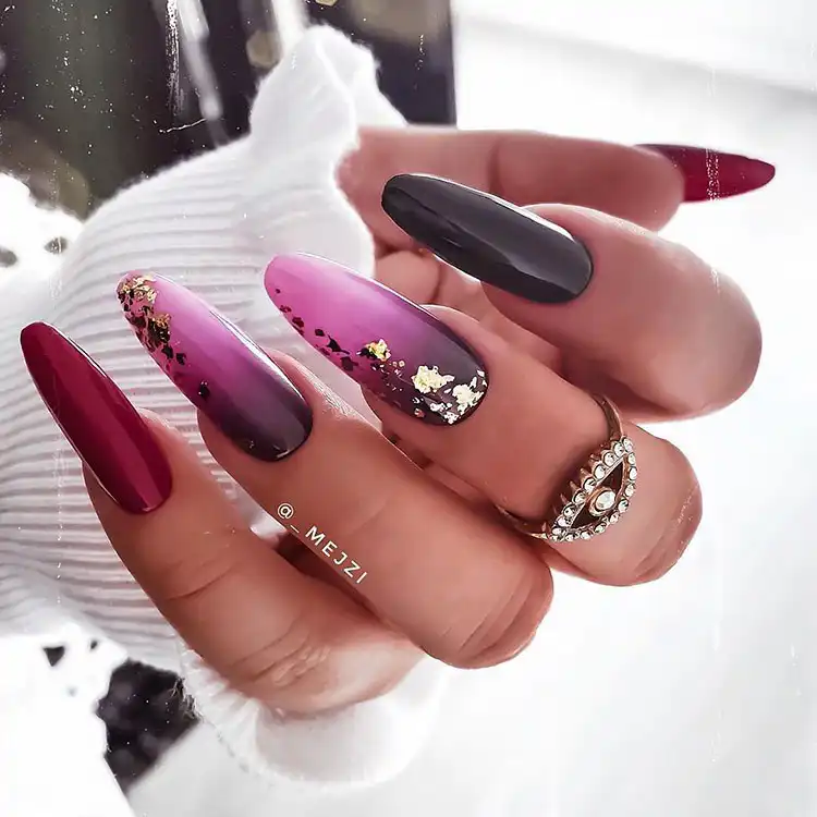 Stunning Blue Nail Designs - Perfect Winter Nail Design Ideas 18 Unique Purple Holiday Nails, a vibrant and sophisticated choice for winter, offering a refreshing pop of color in stunning blue nail designs.