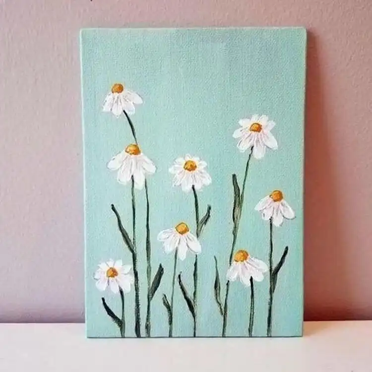 Tall daisy flowers painted with acrylics, offering a bright and cheerful pop of color for home decor.
