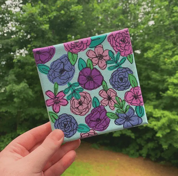 Flower Power canvas painting, featuring brightly colored flowers and simple shapes symbolizing peace and love.