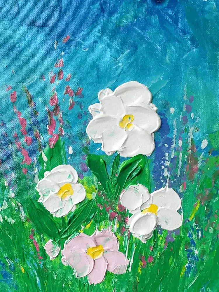 Textured field of flowers created with a palette knife and thick acrylic paint on canvas.