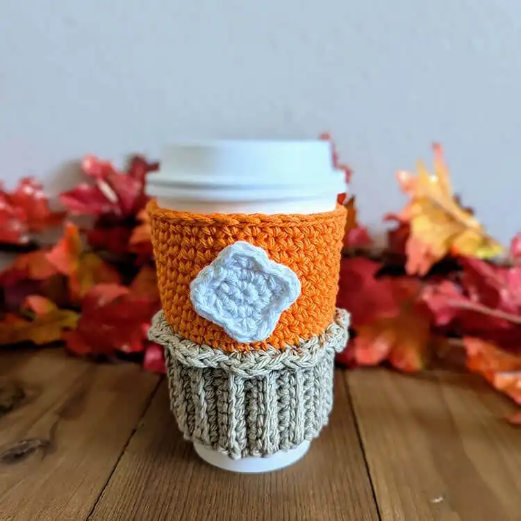 Crochet pumpkin pie cup cozy on a coffee cup