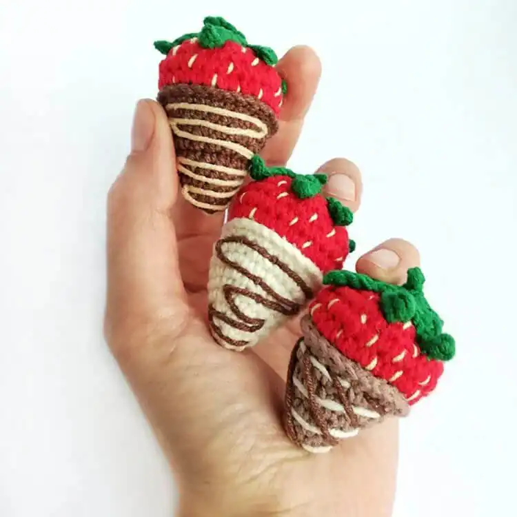 Crochet pineapple upside-down cake amigurumi with pineapple rings and cherries