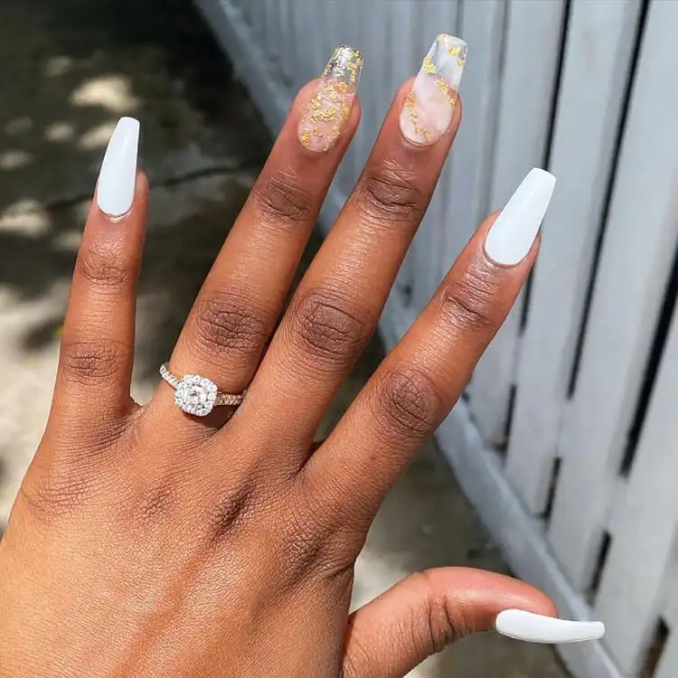 Modern white and clear nail design on dark skin, featuring negative space and clean lines, a contemporary choice from The Best Nail Designs for Dark Skin Women - Brown Acrylic Nails