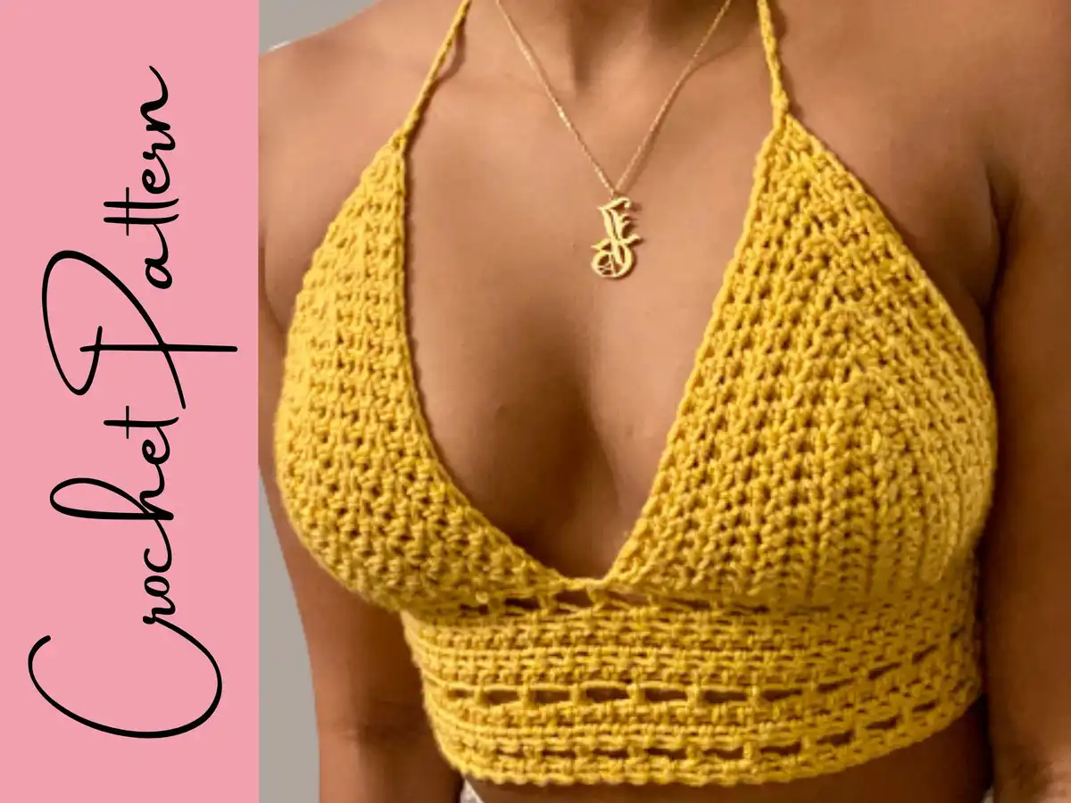Front view of a woman wearing the completed Stella Crop Top Free Crochet Pattern in yellow, highlighting the bra cup construction and textured body.