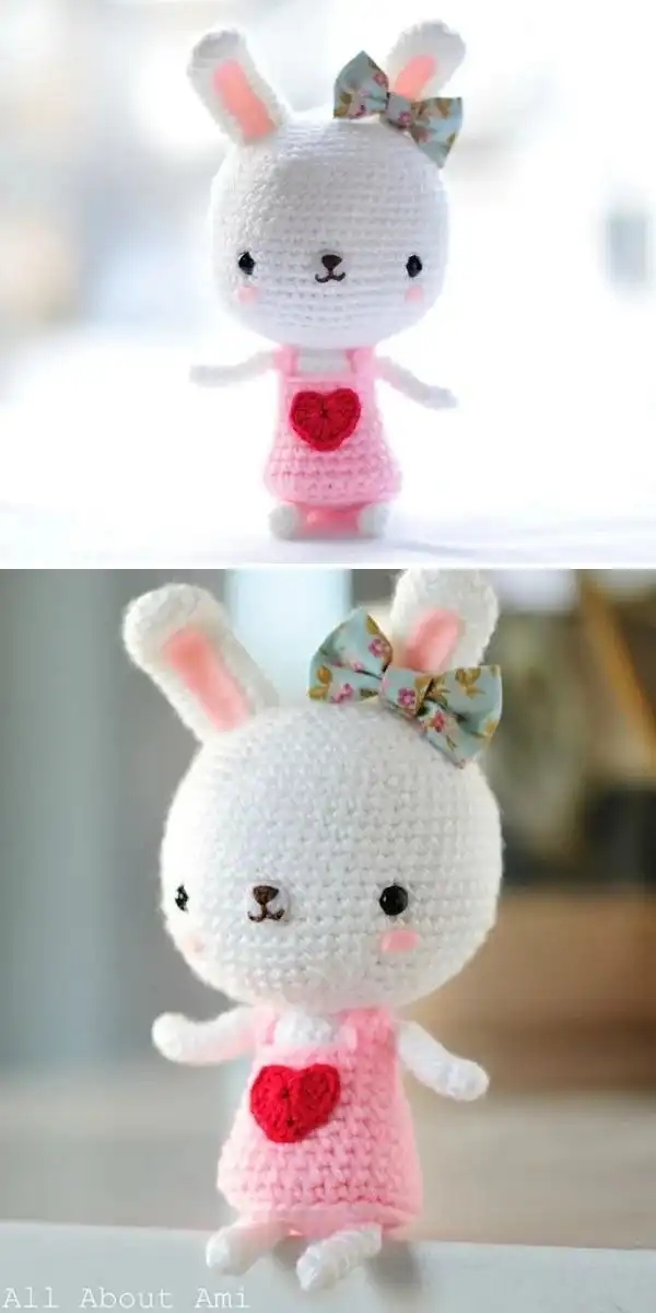 A soft, velvet 'Pocket Pal – Bunny' amigurumi in pastel pink, designed to fit in a pocket, a precious Valentine's keepsake.