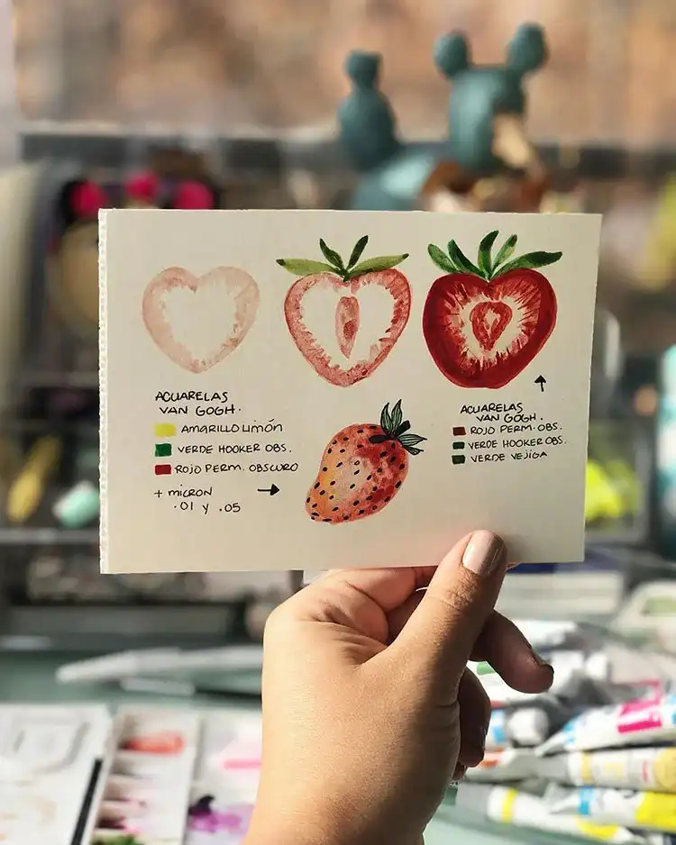 Watercolor Cherry Cheesecake Dessert Tutorial - Watercolor Painting Ideas 22 Watercolor painting of a halved strawberry, showcasing juicy interior and seeds.