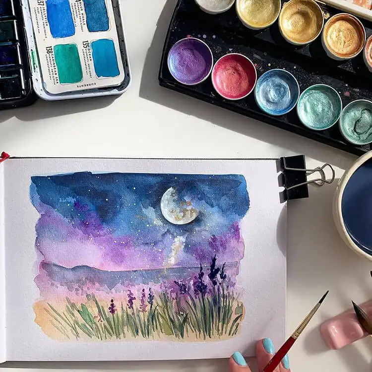 Evening beach scene painting with purple and blue sky reflecting on the water and a visible moon.