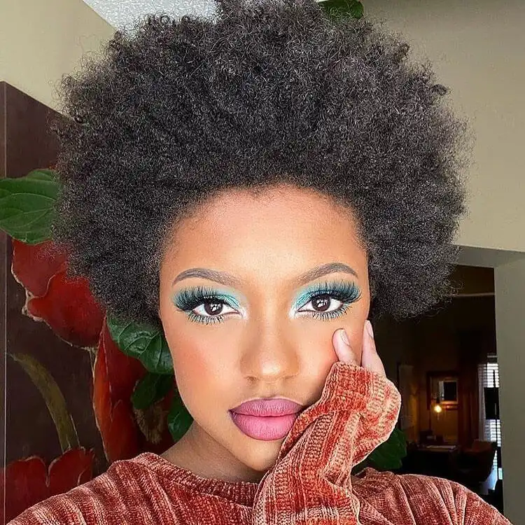 Stunning model showcasing radiant Winter Makeup Ideas for the Holiday Season with sparkling eyes and flawless skin.