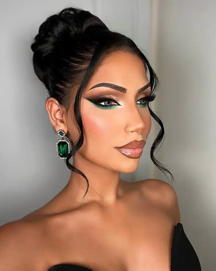 A model showcasing a fresh and radiant winter glow, with luminous foundation and subtle highlighter.