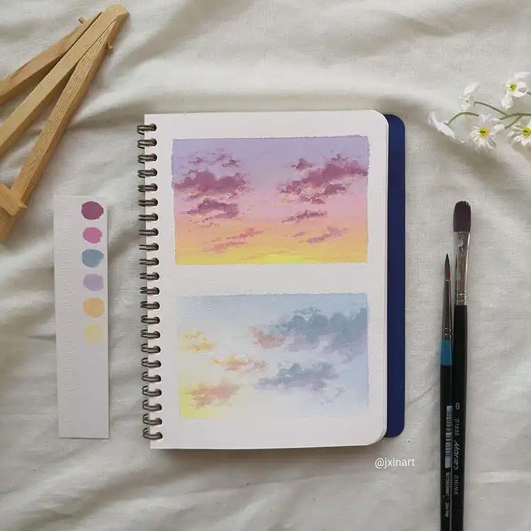 Serene Purple and Blue Clouds watercolor painting, illustrating soft, calming hues and delicate cloud textures.