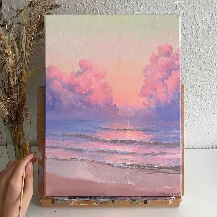 A serene Sunset on the Beach watercolor painting, featuring warm oranges, pinks, and blues reflecting on the water.